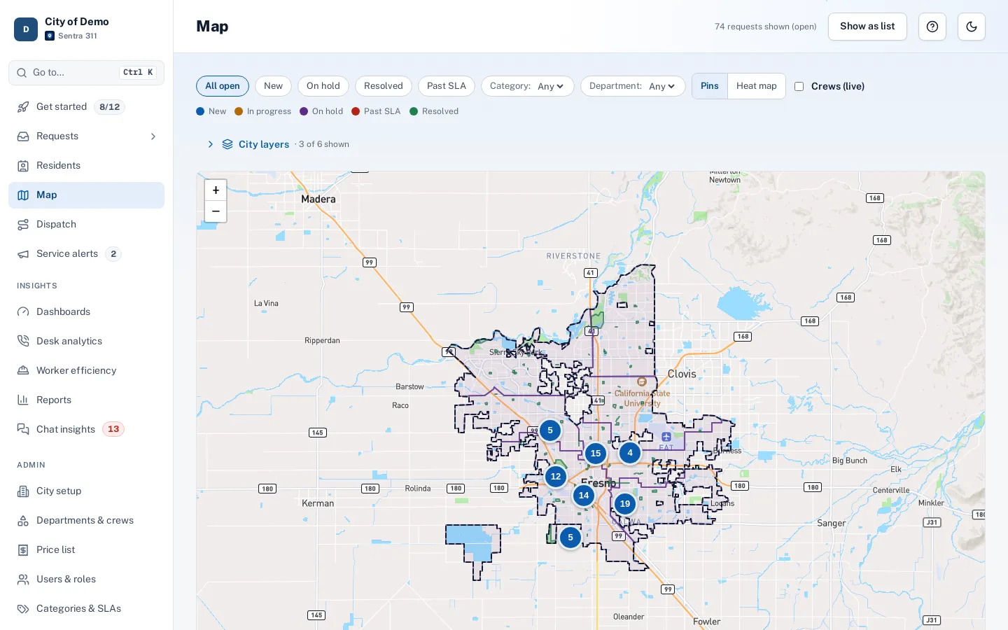 The city map with request pins and clusters, layer toggles and council district boundaries.